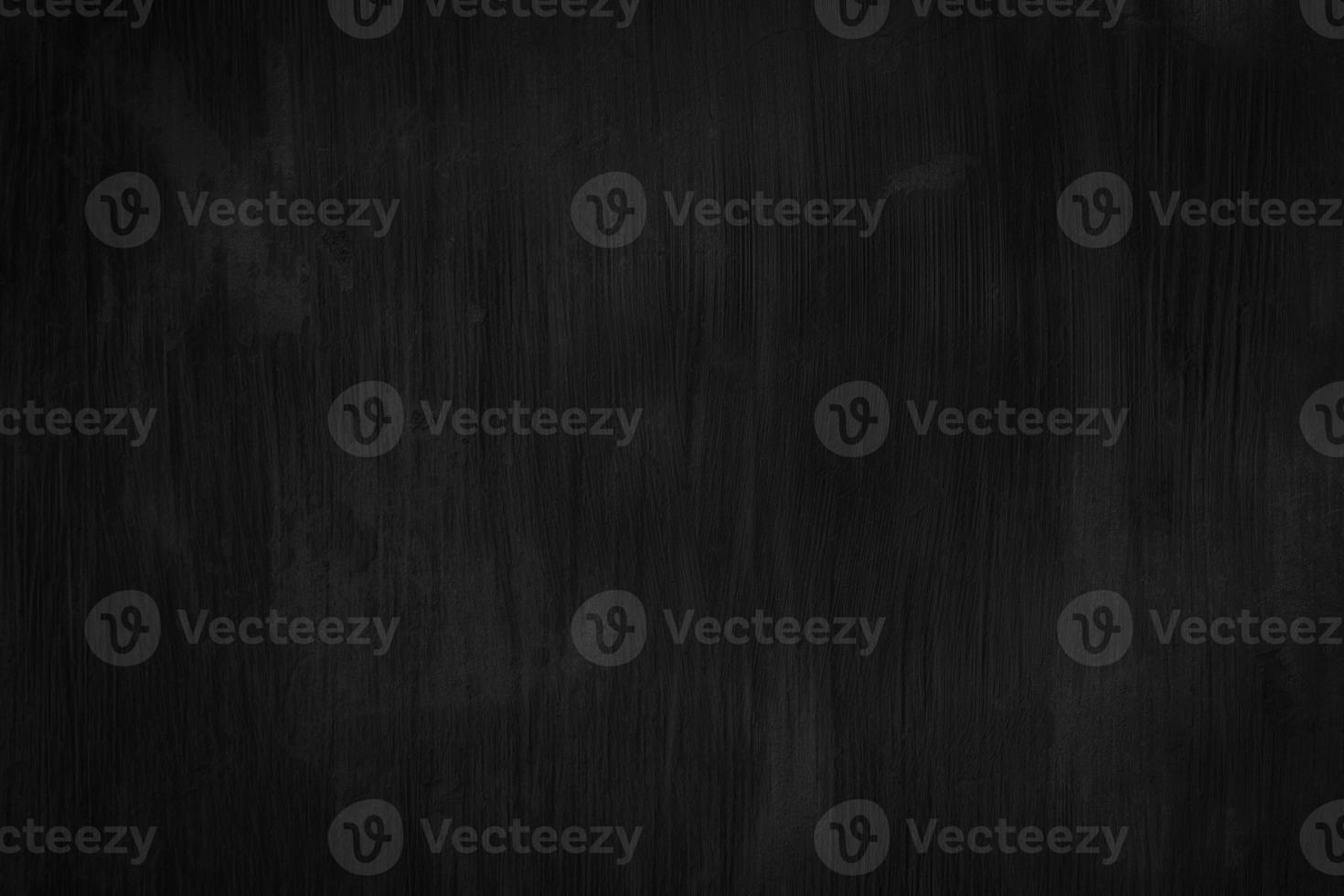 Black Cement scratch background. Texture placed over an object to create a grunge effect for your design. photo
