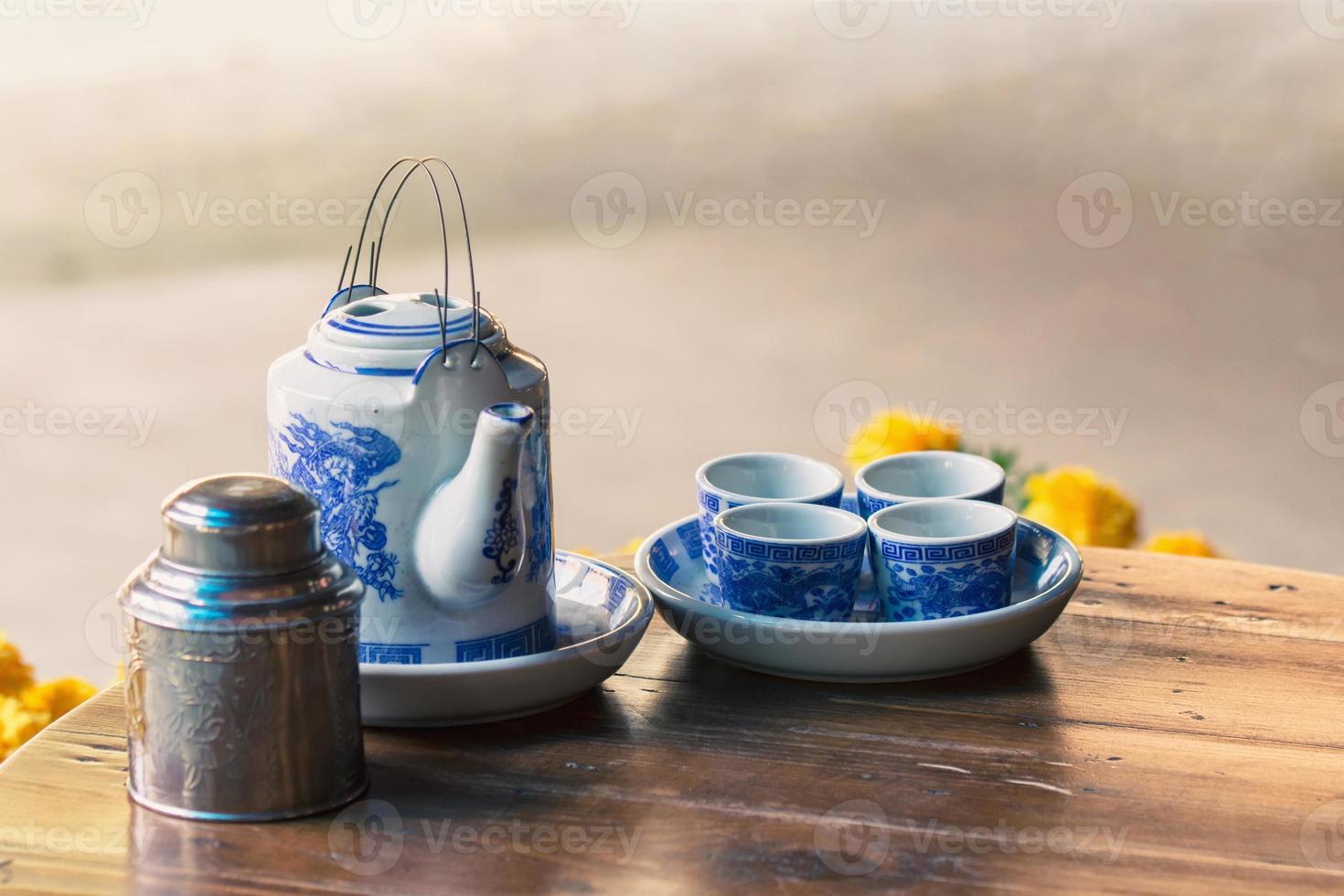 Tea sets on wooden table photo