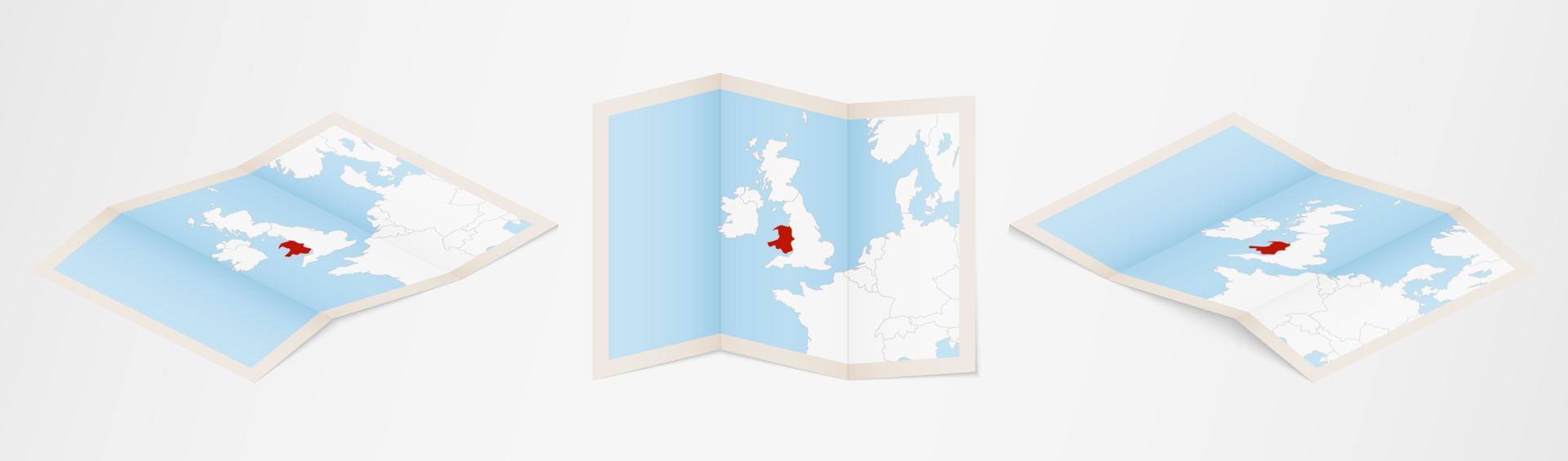 Folded map of Wales in three different versions. vector