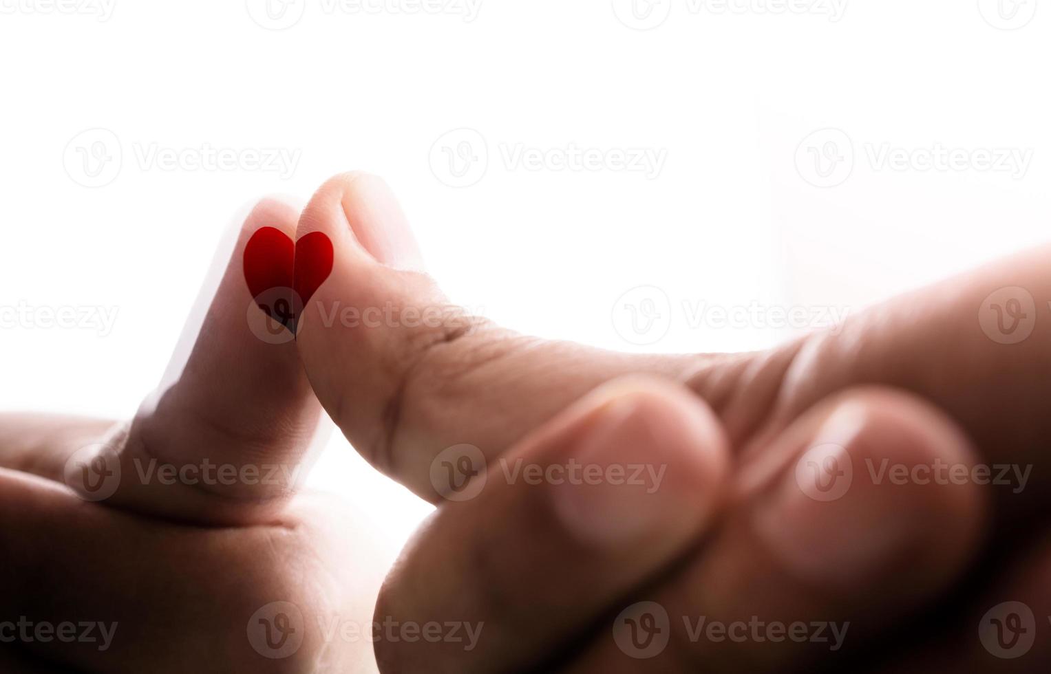 Conceptual Photo for Love and Relationship. Love Yourself. Single Person form a Heart Shape on the Mirror. Fill Yourself with Romance on Valentines Day