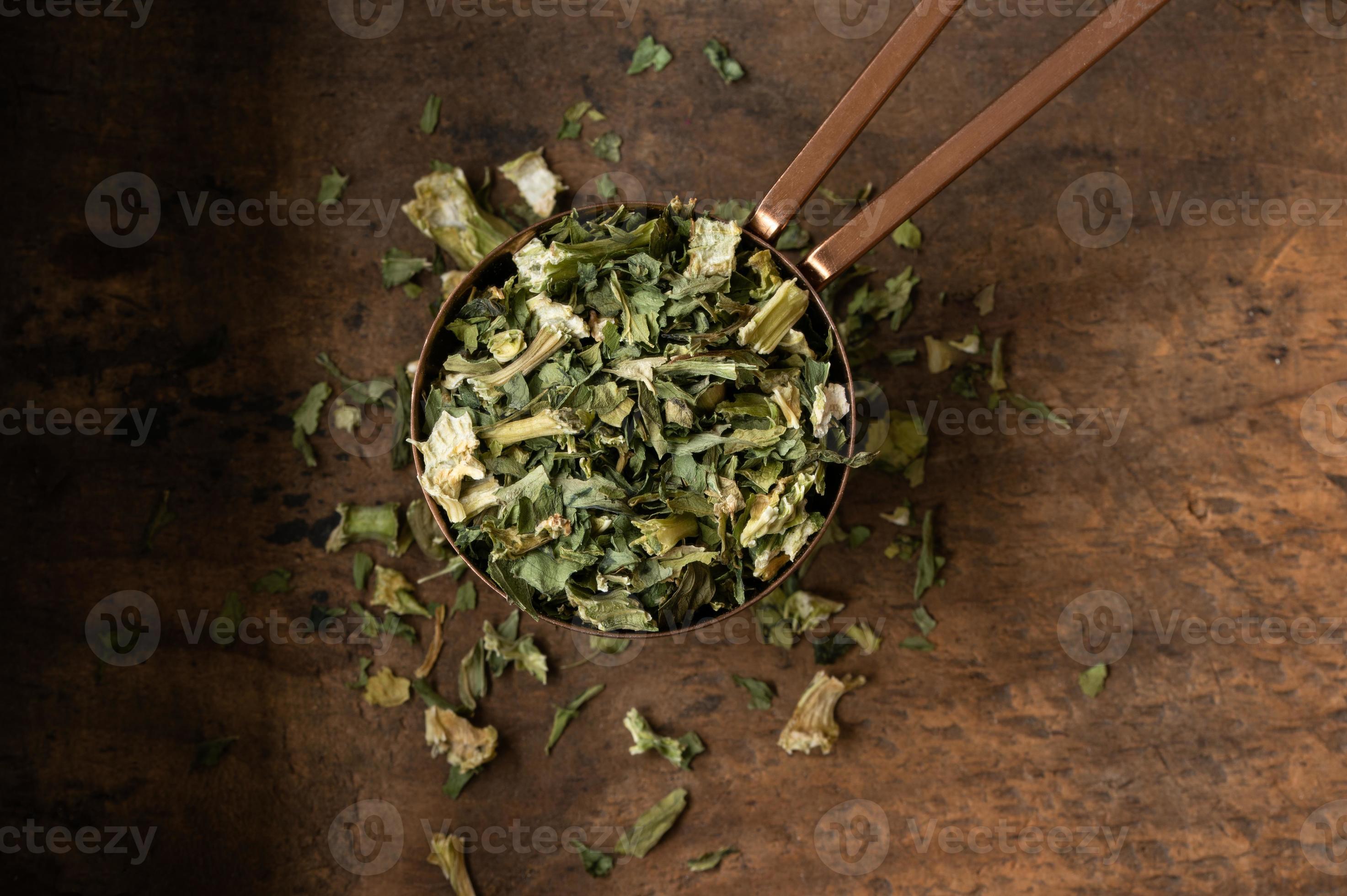 Dry Celery Flakes Spilled from a Teaspoon 17687857 Stock Photo at Vecteezy