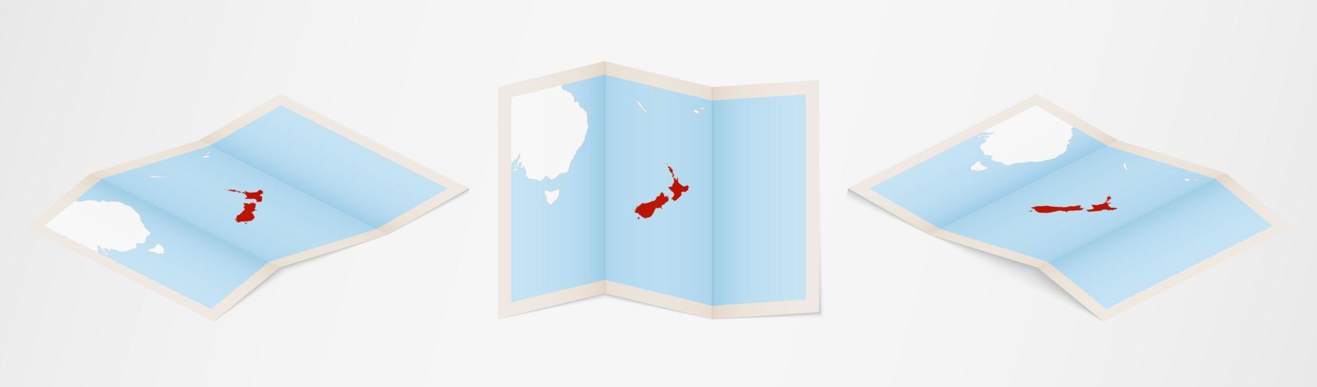 Folded map of New Zealand in three different versions. vector