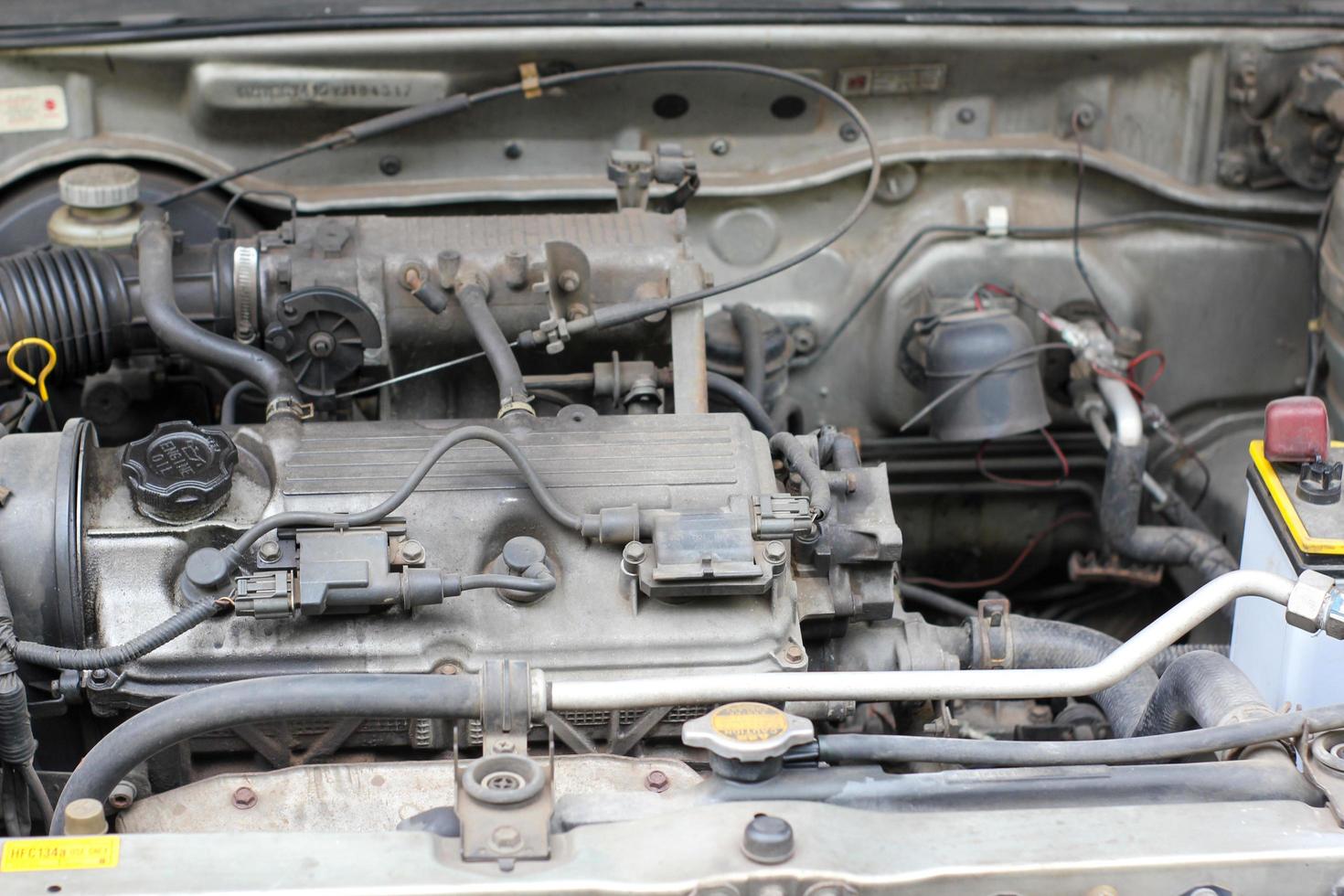 dirty engine room of an old car photo