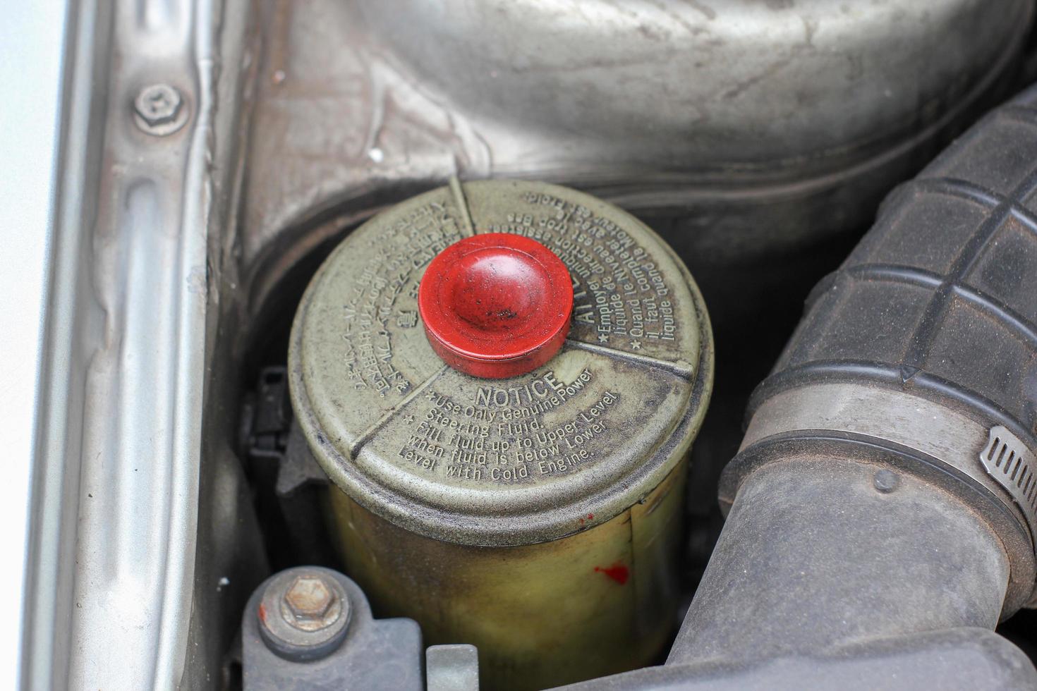 Old car Break fluid in the car engine room photo