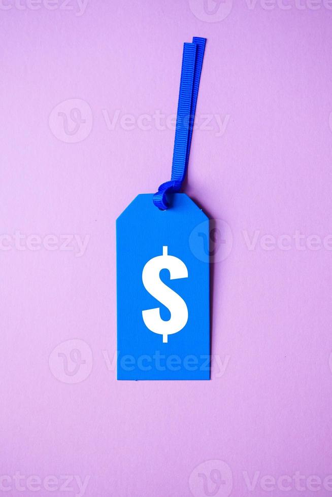 símbolo de dólar en la etiqueta de precio azul foto