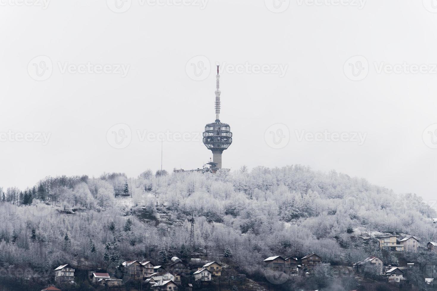 Winter view of destroyed Sarajevo TV Tower. The Hum Tower or Toranj Hum is a telecommunication tower located on Mount Hum in the periphery of Sarajevo. Symbol of a city. photo
