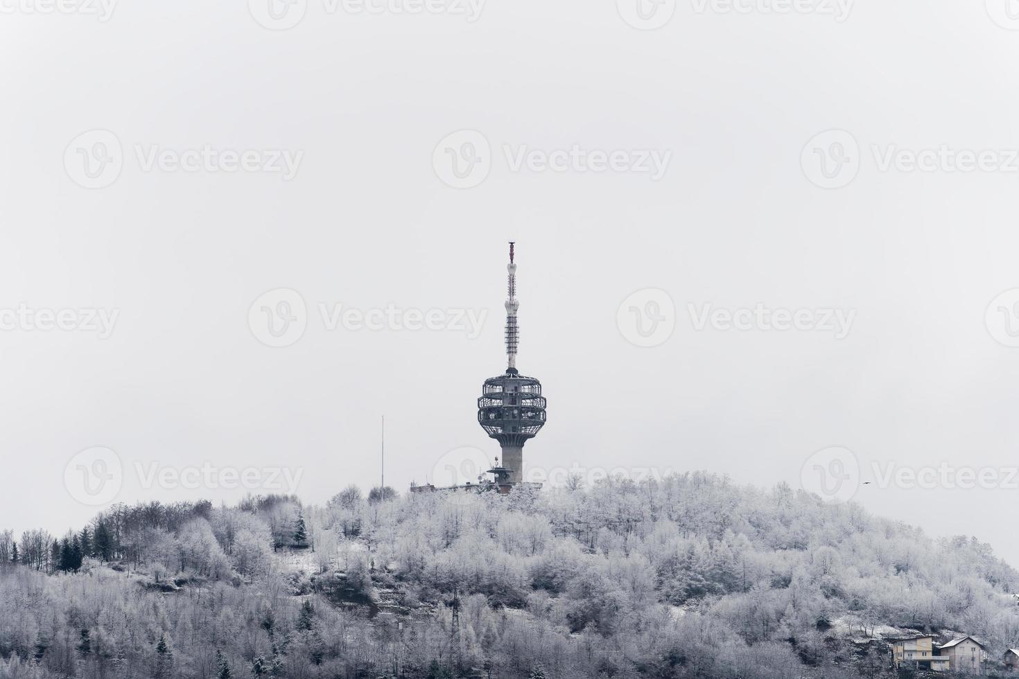 Winter view of destroyed Sarajevo TV Tower. The Hum Tower or Toranj Hum is a telecommunication tower located on Mount Hum in the periphery of Sarajevo. Symbol of a city. photo