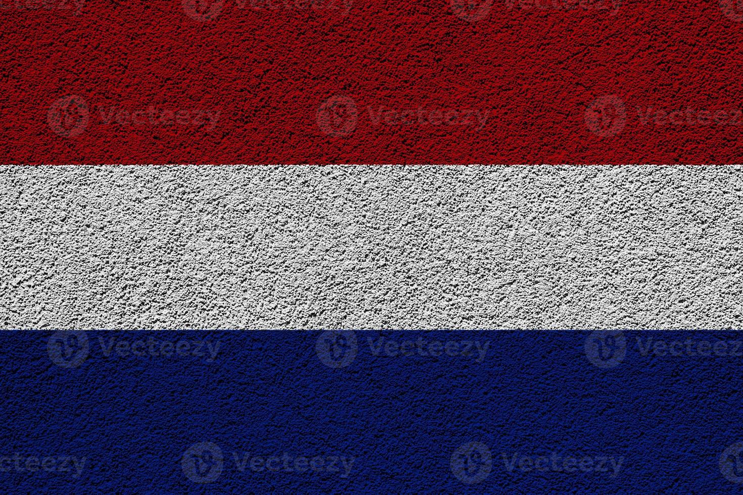 Netherlands flag on a textured background. Concept collage. photo