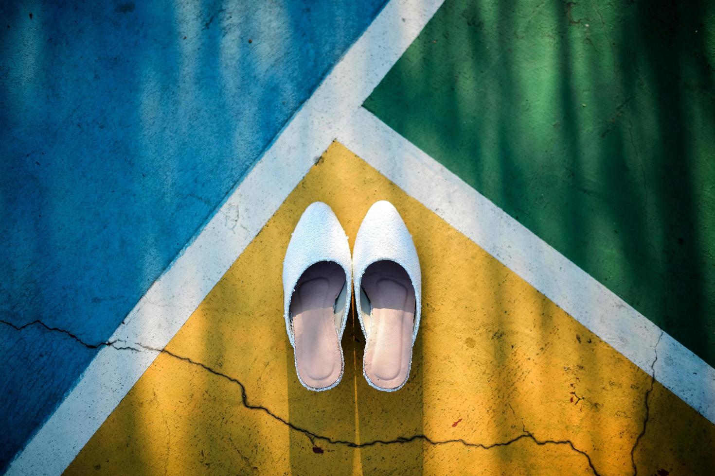 A Pair of Bride's Shoes for a Traditional Wedding Ceremony in Indonesia photo