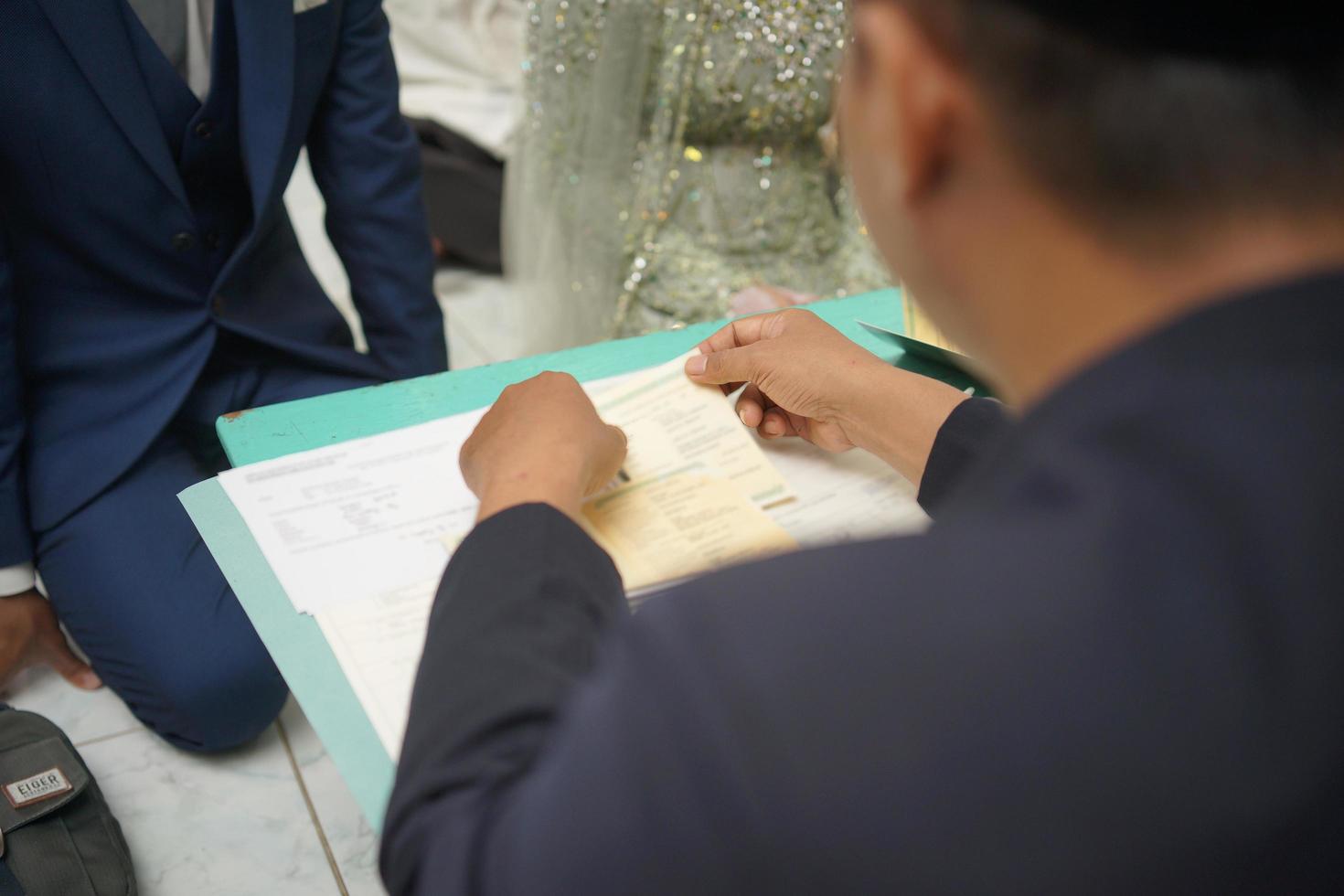 Groom Preparing for a Traditional Wedding Ceremony in Indonesia photo