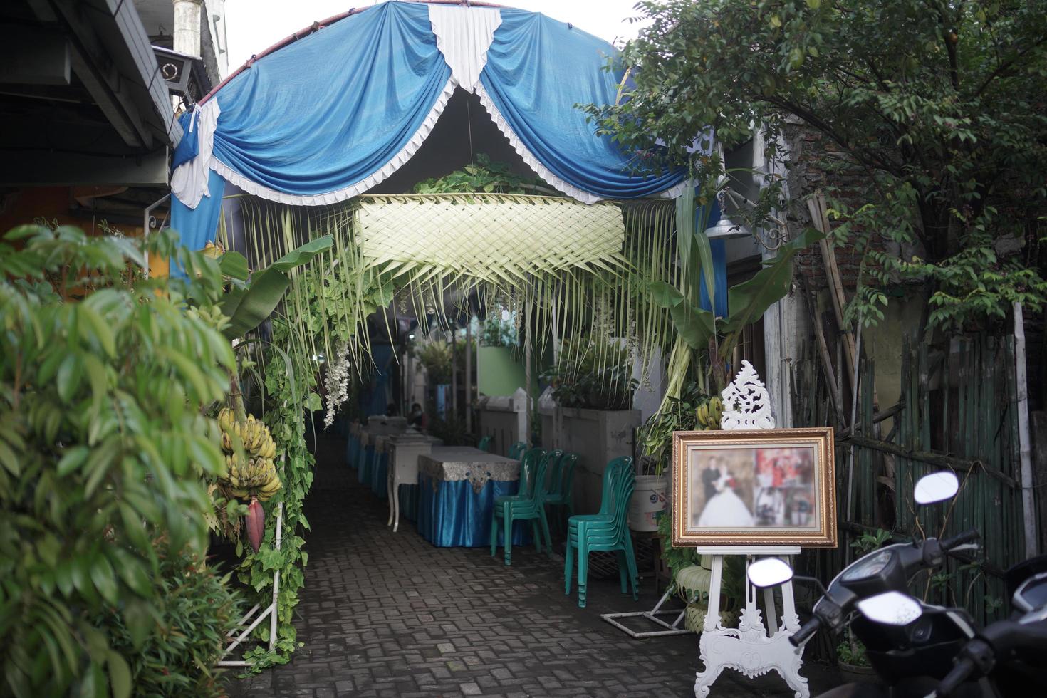 Wedding Aisle in a Traditional Wedding Ceremony in Indonesia photo