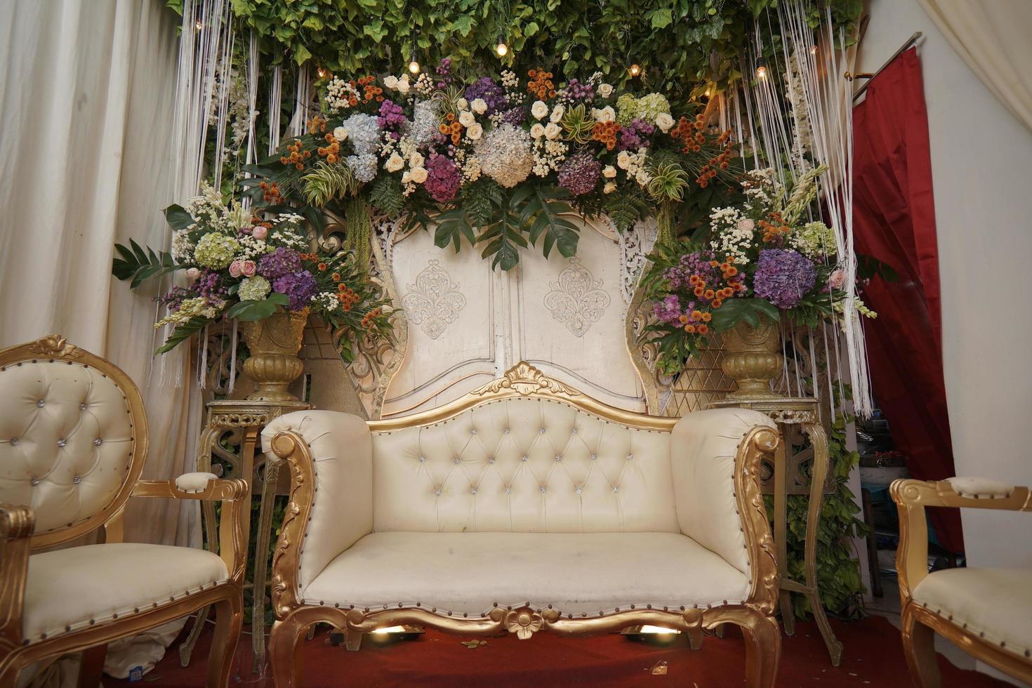 Chairs and Decoration Arrangement for a Traditional Wedding Ceremony in Indonesia photo