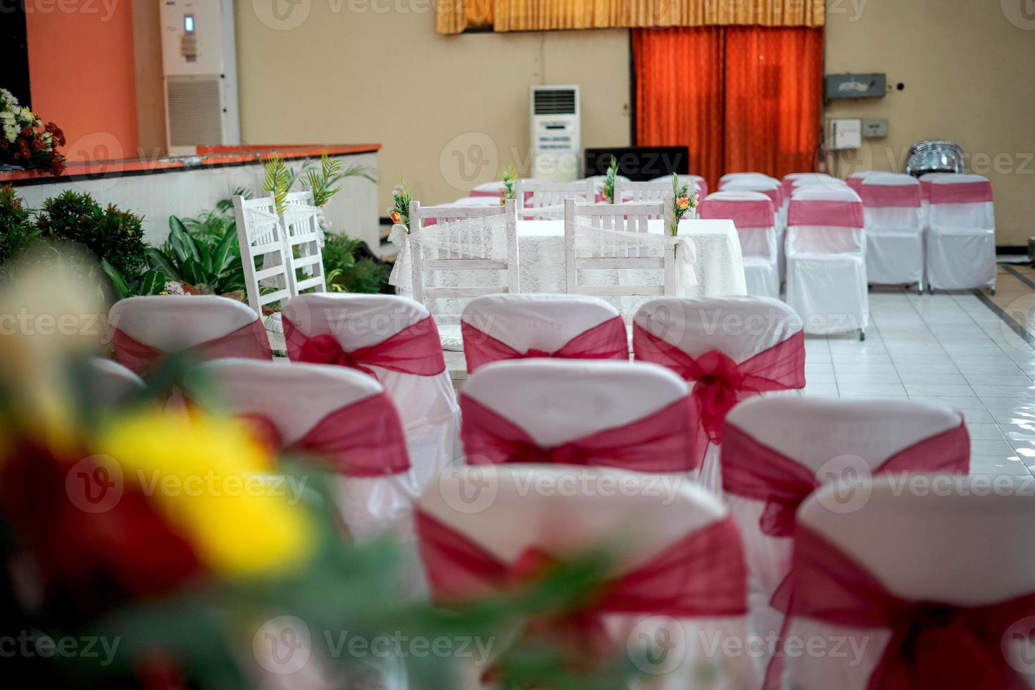 Chairs and Decoration Arrangement for a Traditional Wedding Ceremony in Indonesia photo