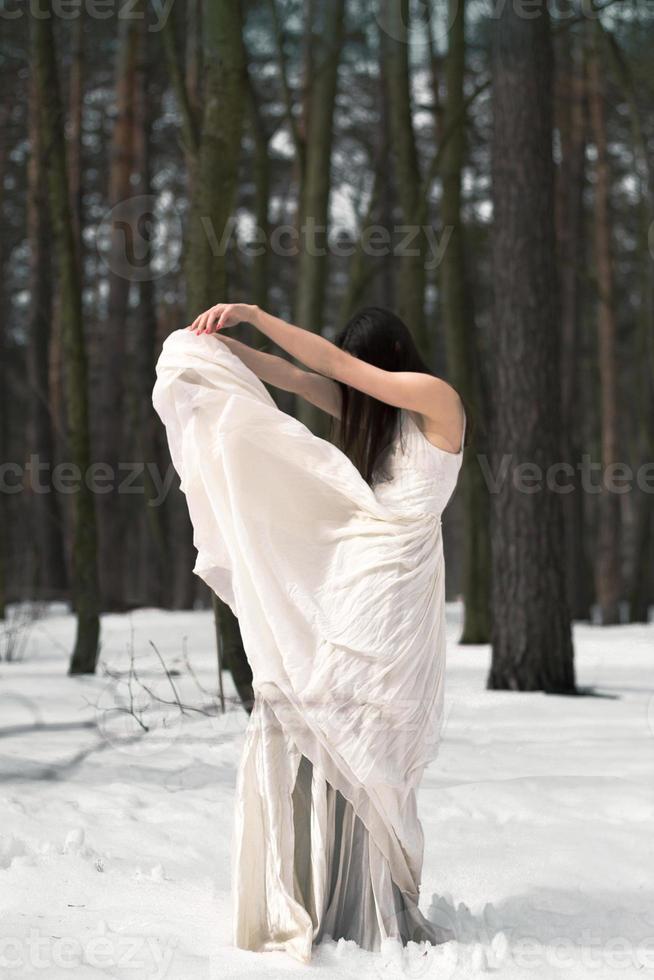 Elegant lady in white dress posing scenic photography photo