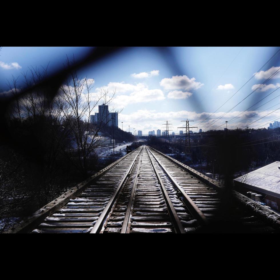 Train Tracks Through Fence photo