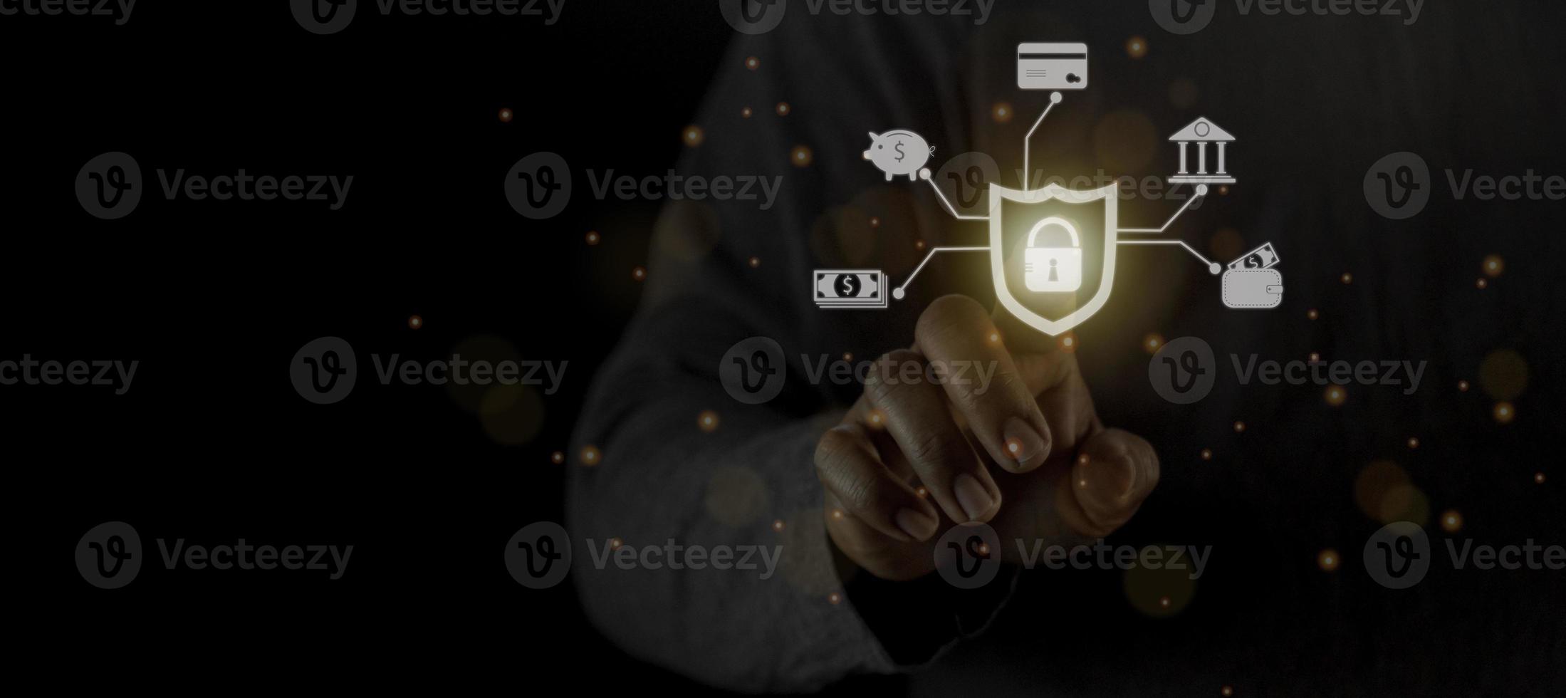 Businessman holding light icon social security network connection with shield guard to protected from cyber attacks. Network security system concept photo