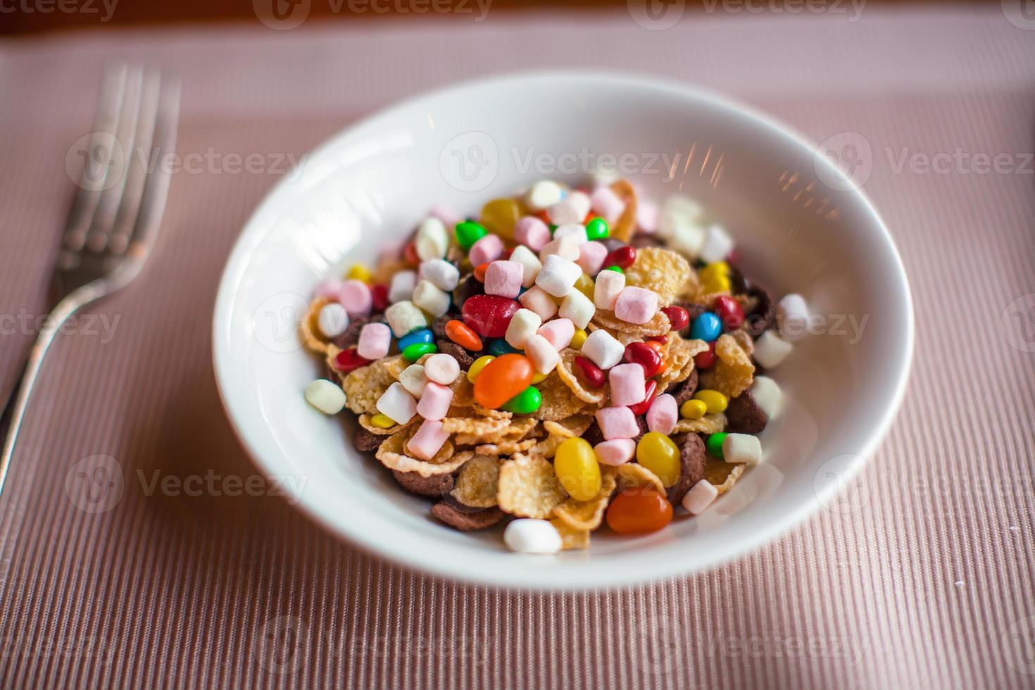 Fresh colorful granola breakfast in open cafe photo