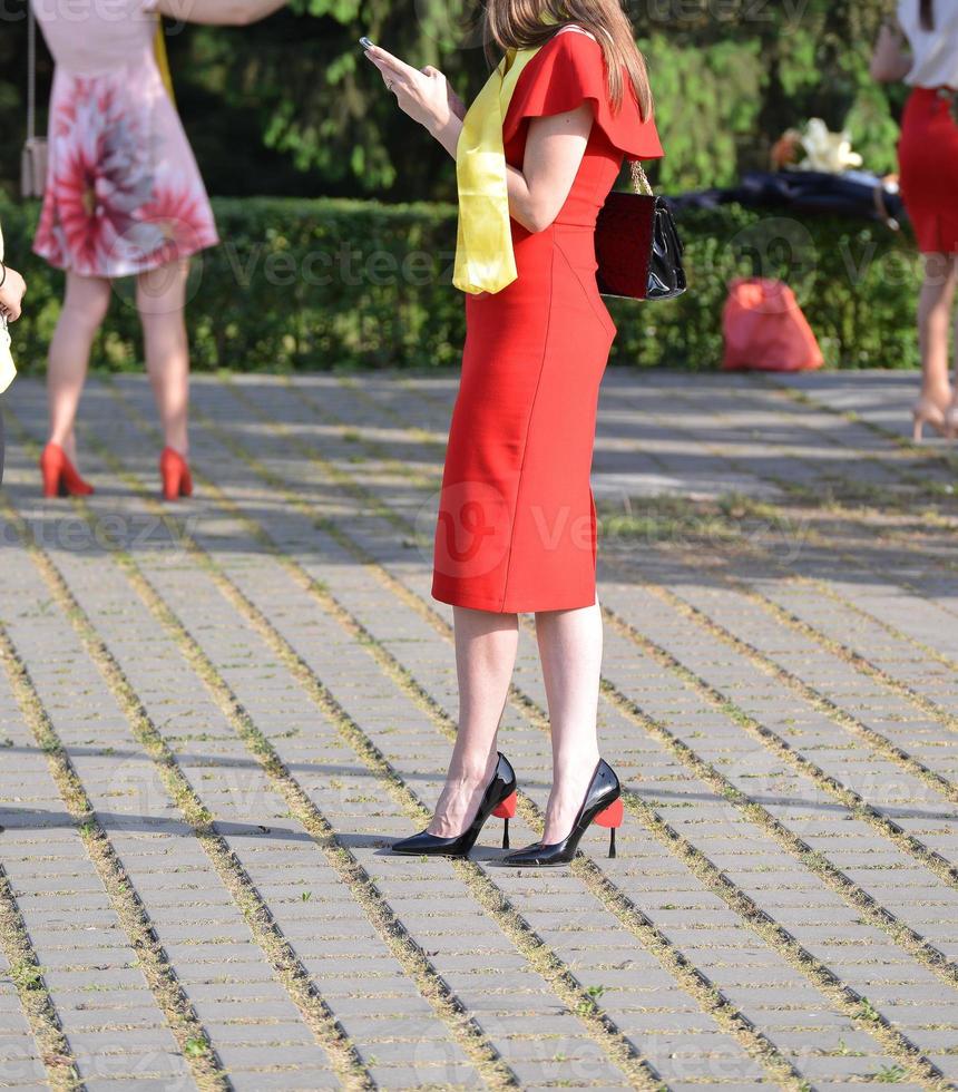 university graduating students are having a photo shooting in the park