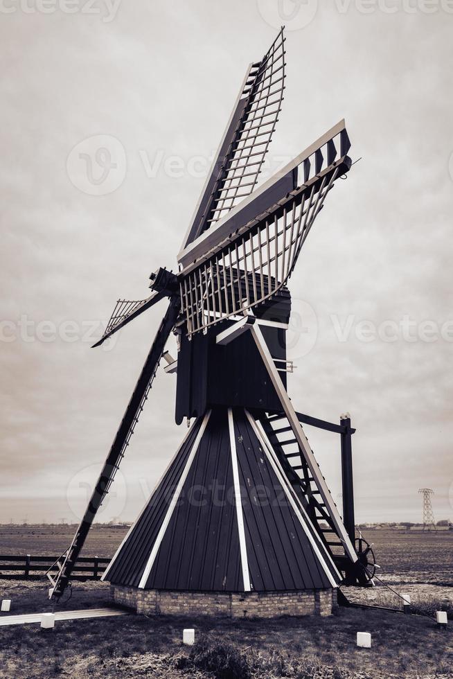 Mellemolen, dutch windmill in Akkrum, the Netherlands. In the winter with Some snow. photo