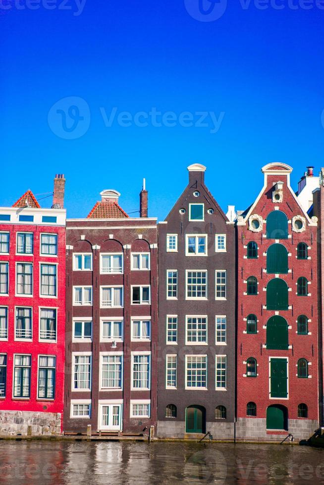 Traditional dutch medieval houses in Amsterdam capital of Netherlands photo