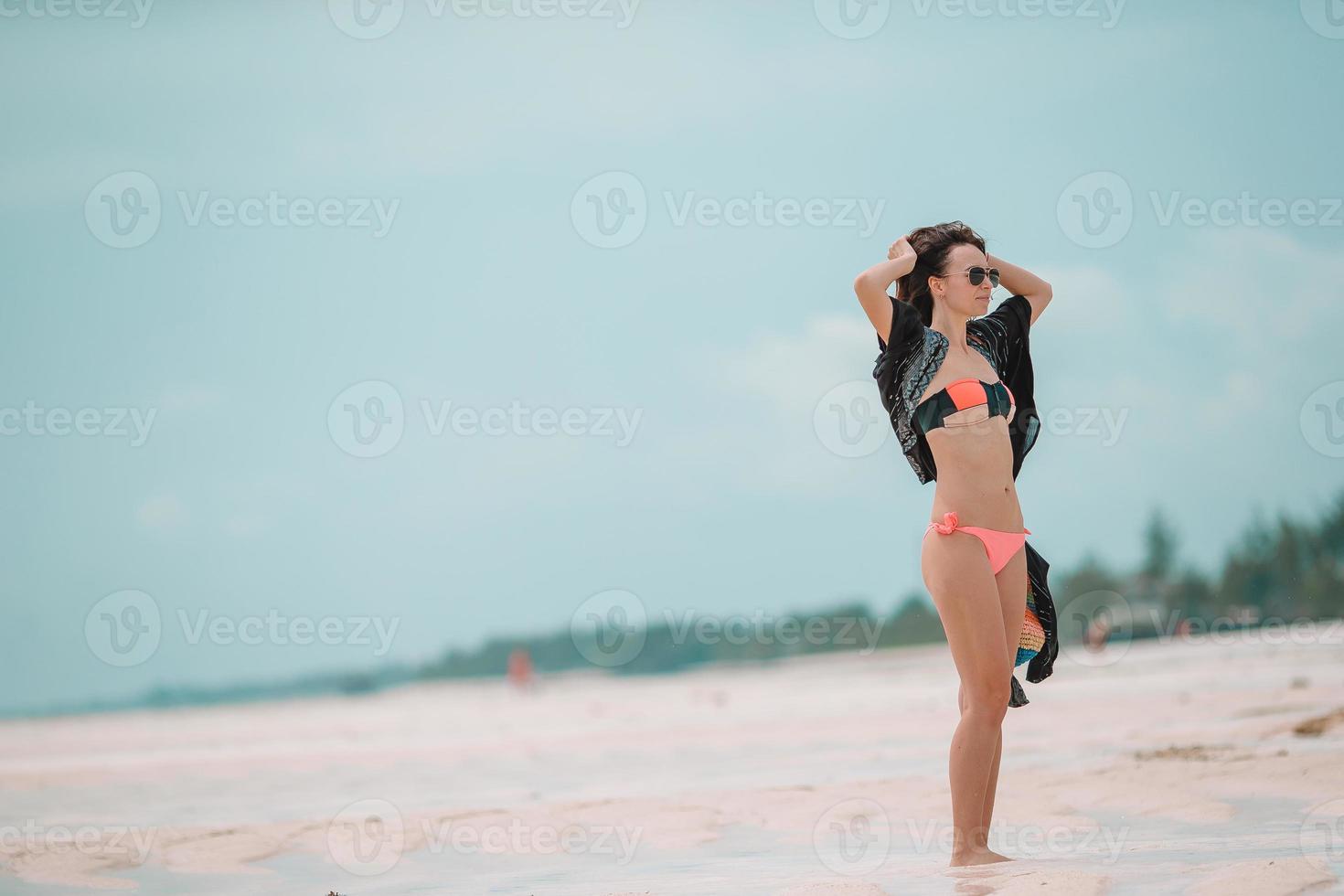 Young beautiful woman on the beach vacation photo