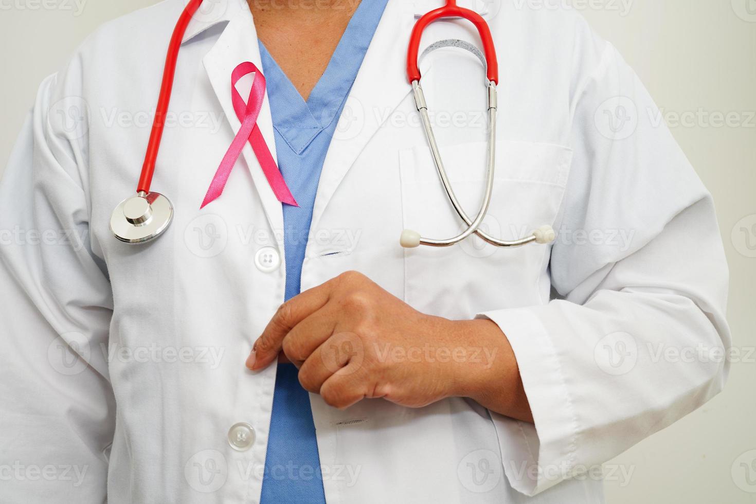 Asian woman with pink ribbon, World Breast Cancer Day at October. photo