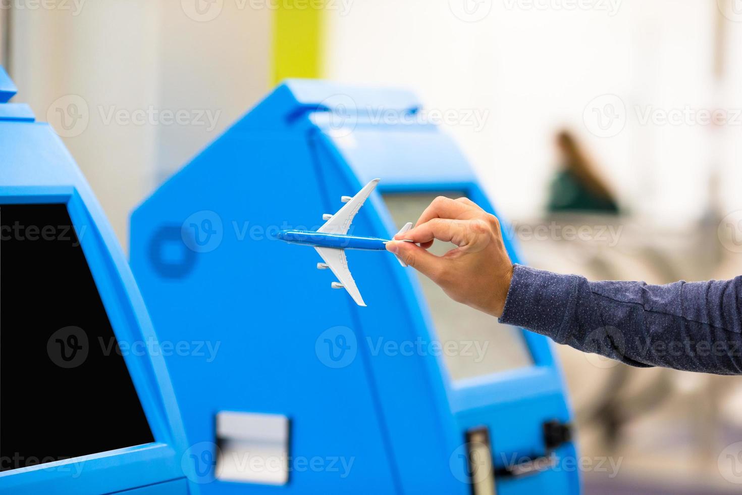 Close-up self-check-in for flight or buying airplane tickets at airport photo