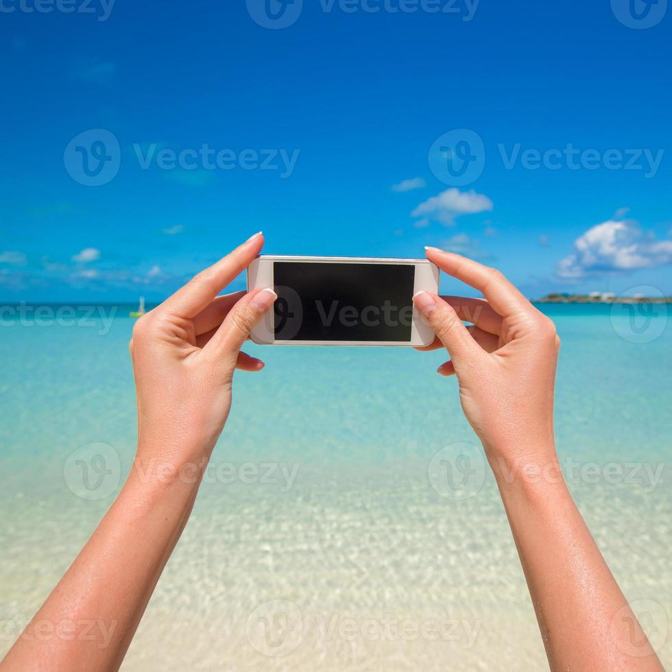 Close up phone background turquoise sea on wxotic resort photo