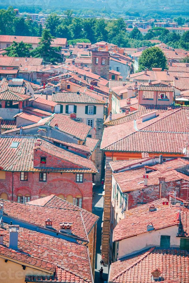 Aerial view of ancient building with red roofs in Lucca photo