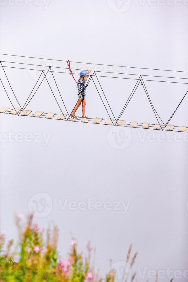 The rope bridge on the top of mountain of Rosa Khutor, Russia photo