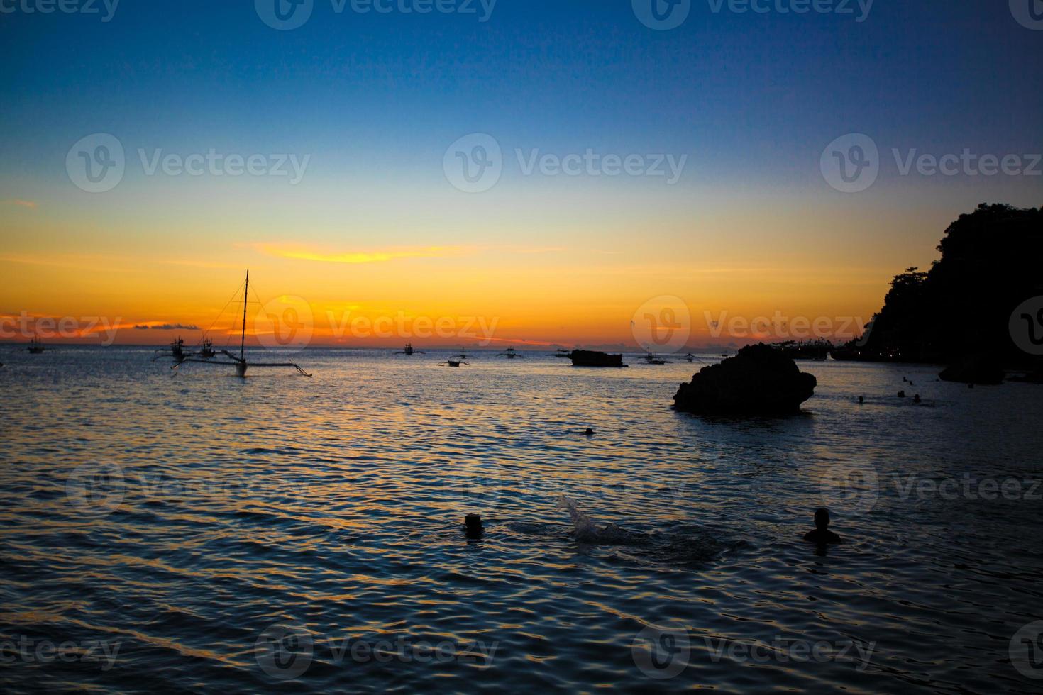 Colorful bright sunset on the island Boracay, Philippines photo