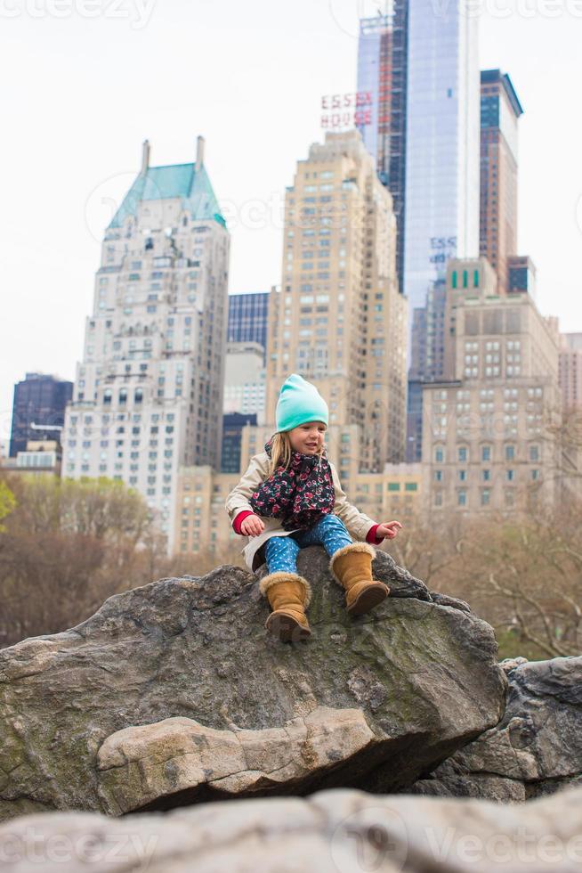 Adorable little girl in Central Park at New York City, America photo