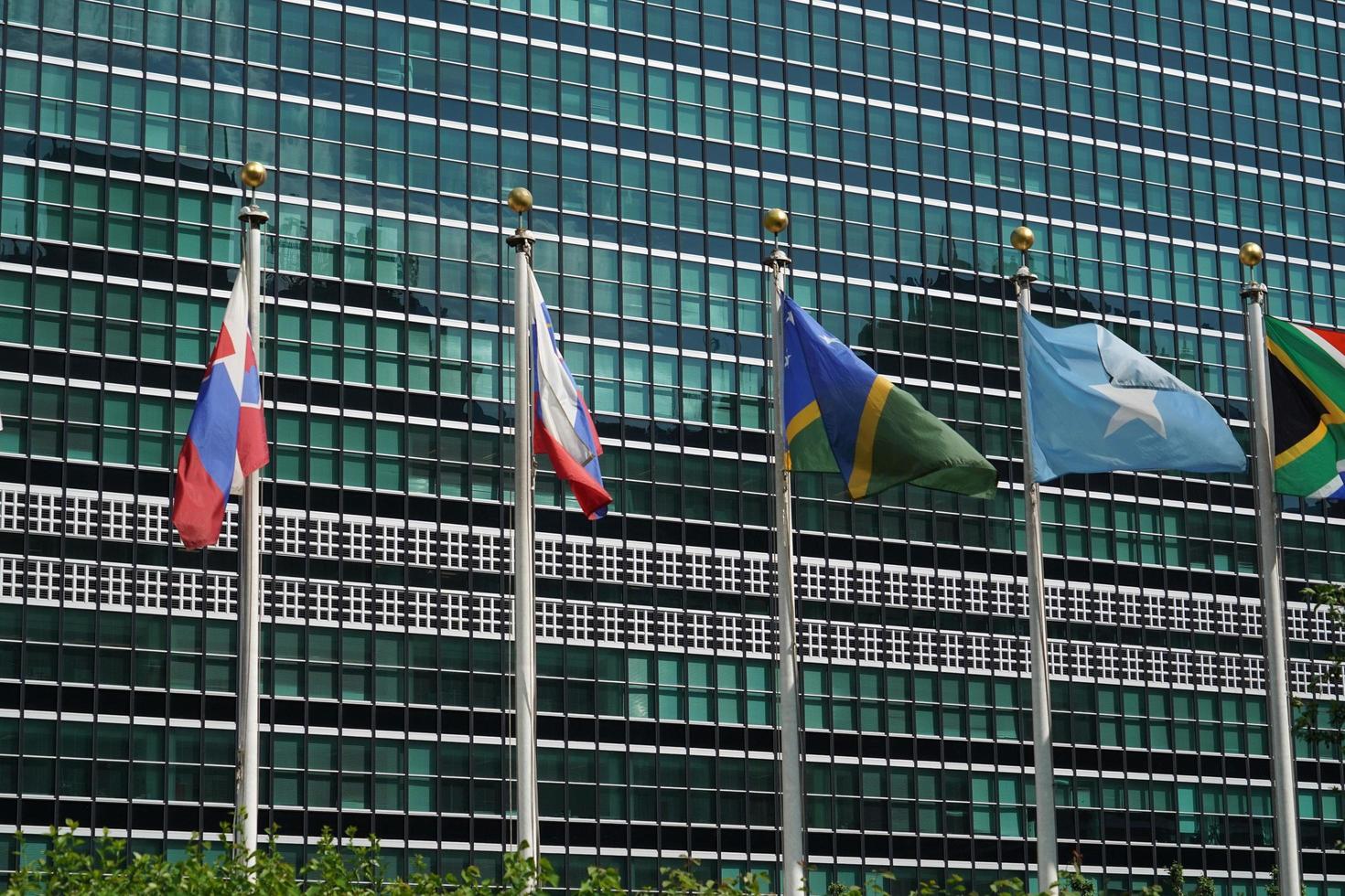 flags outside united nations building in new york, 2022 photo