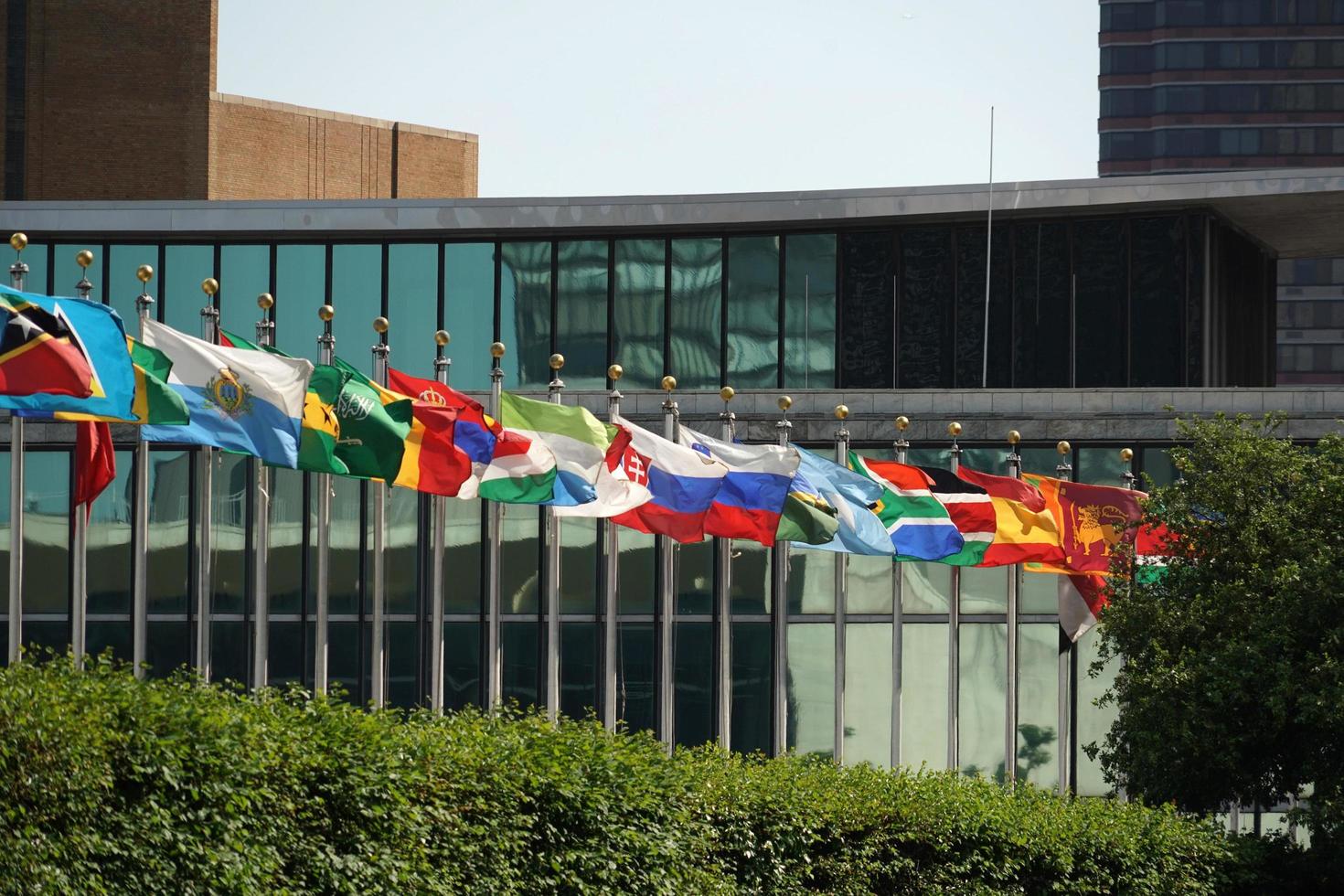 flags outside united nations building in new york, 2022 photo