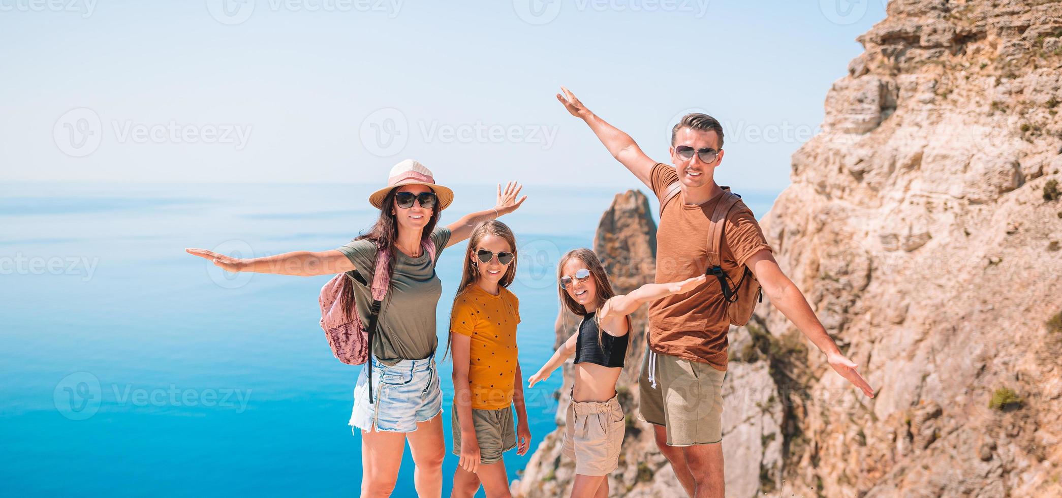 Happy family on vacation in the mountains photo