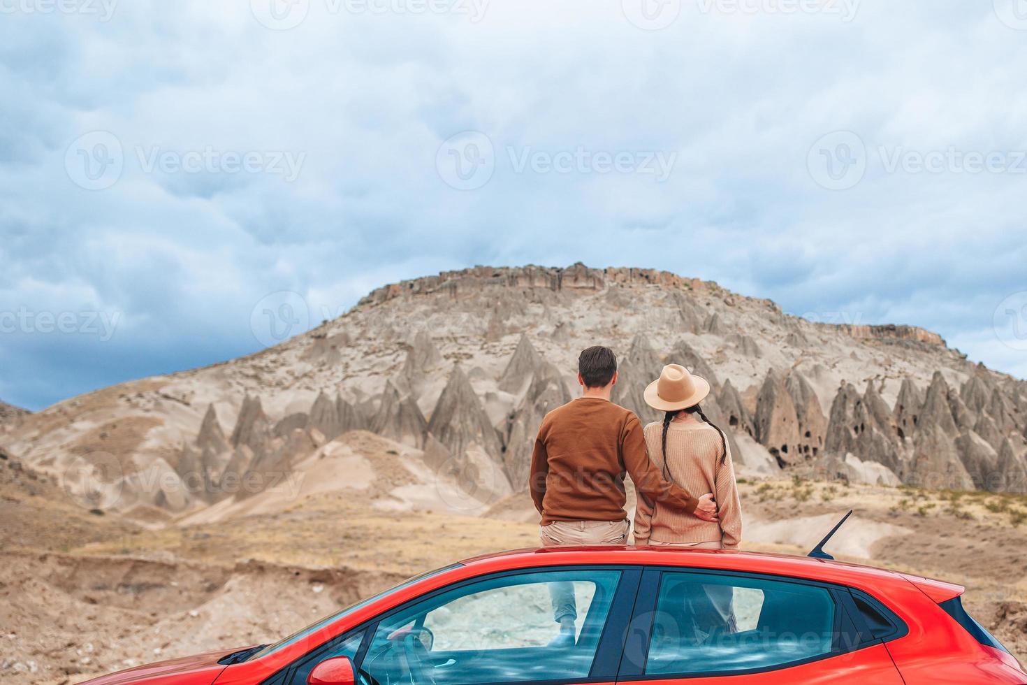 Happy couple on summer car vacation photo