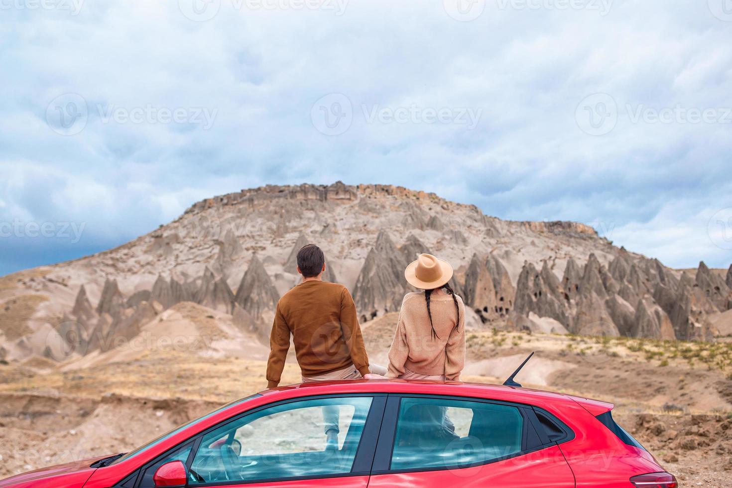 Happy couple on summer car vacation photo