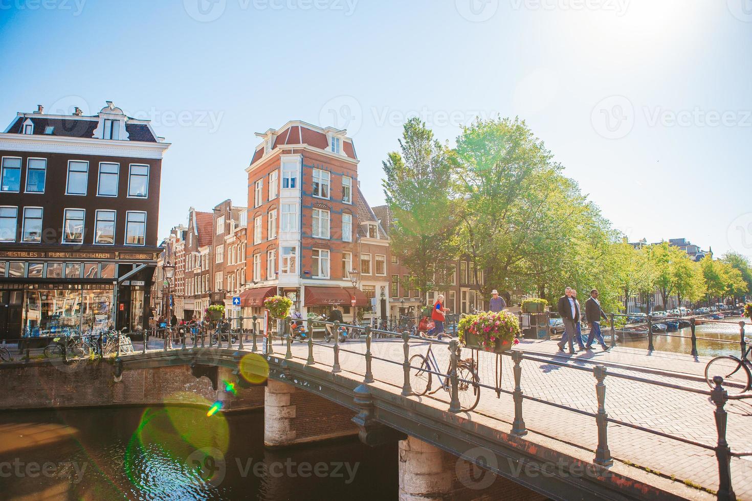 Traditional dutch medieval houses in Amsterdam capital of Netherlands photo