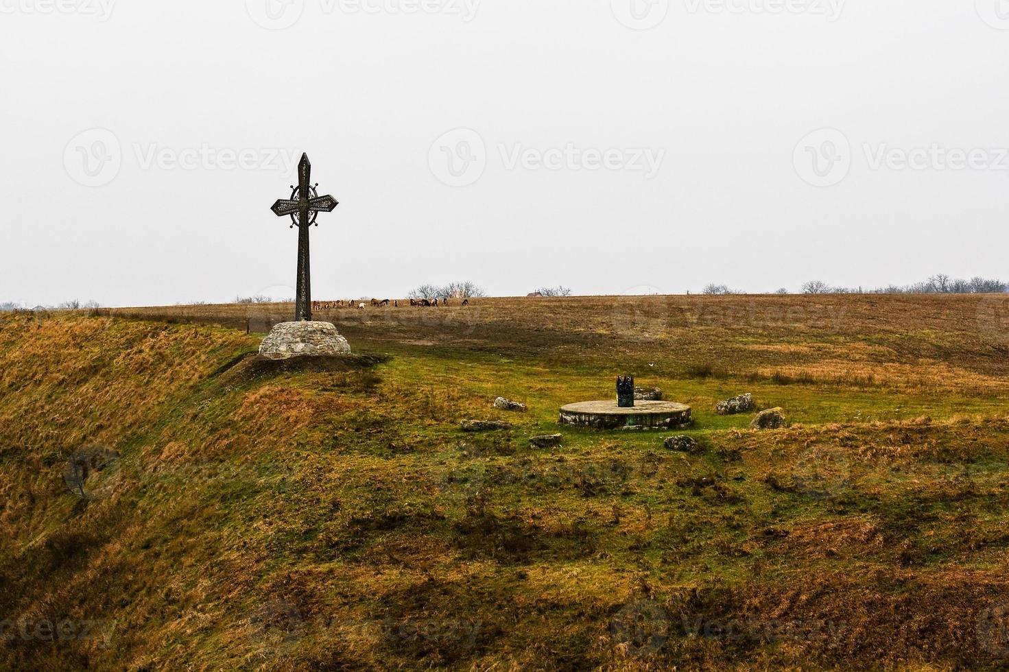 cruz antigua en kamyanets-podilskyi foto