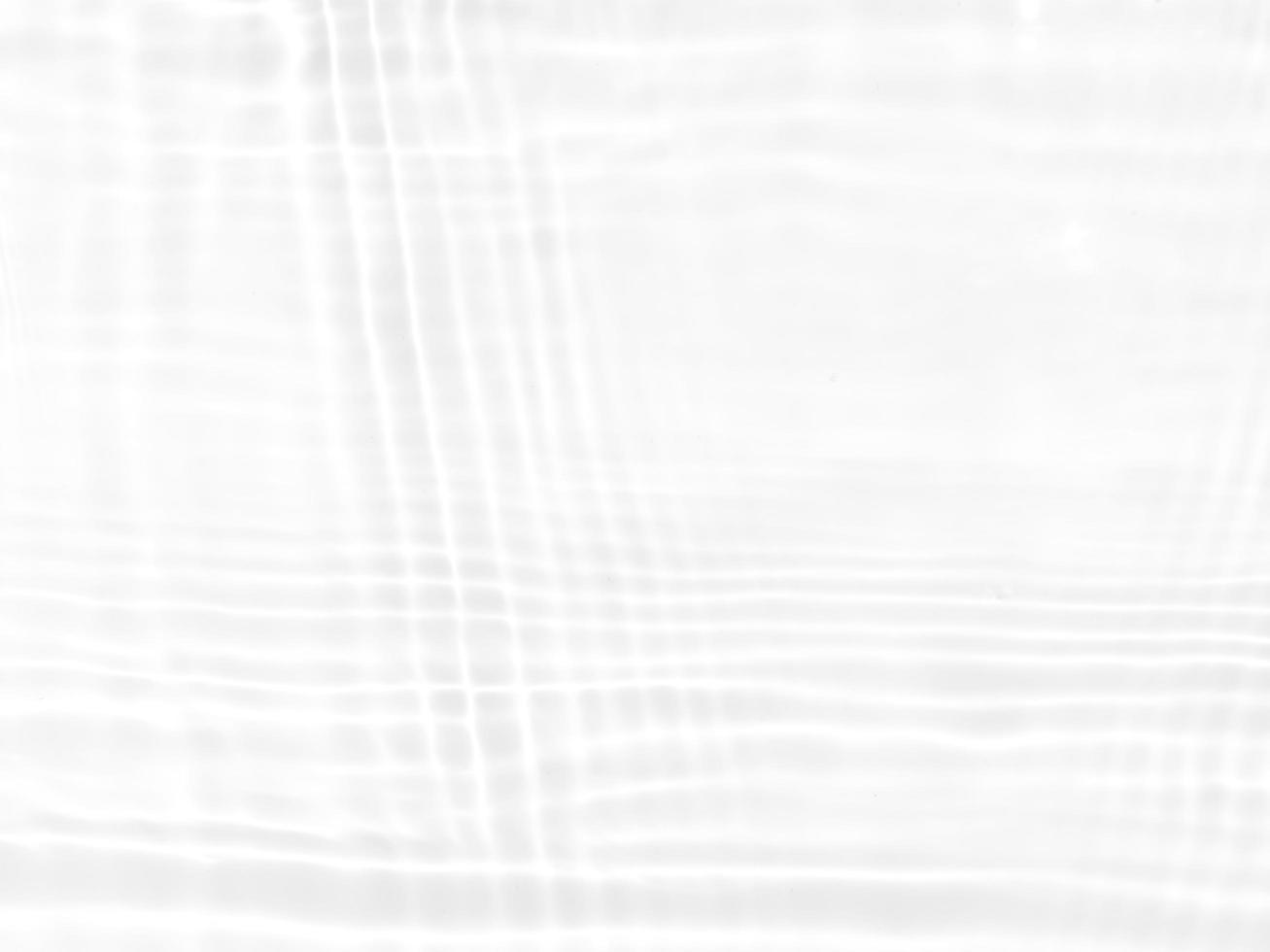 Defocus blurred transparent white colored clear calm water surface texture with splashes and bubbles. Trendy abstract nature background. Water waves in sunlight with copy space. White water shine photo