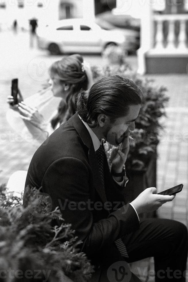young couple bride and groom in a white dress photo