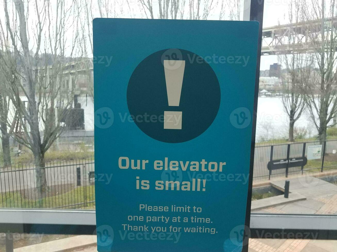 our elevator is small sign covid warning sign photo