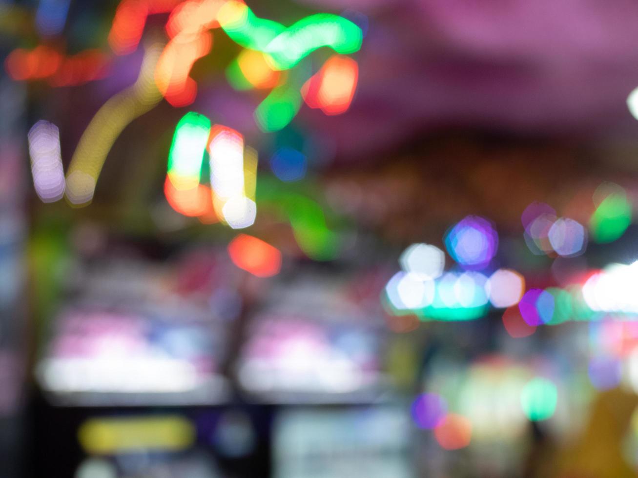 abstract background with defocused bokeh lights and shadows at night, vintage or retro tones, pentagon shaped bokeh photo