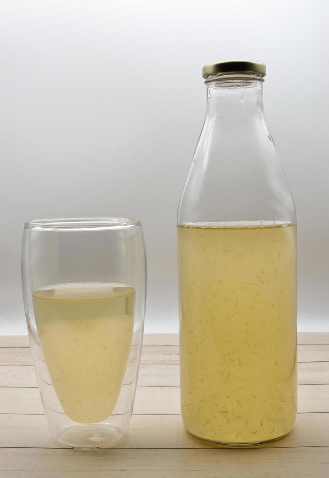 Glass bottle of organic Aloe Vera Bio dietary supplement. Aloe Vera is a plant that is used in dietary supplements due to its potential health benefits. photo