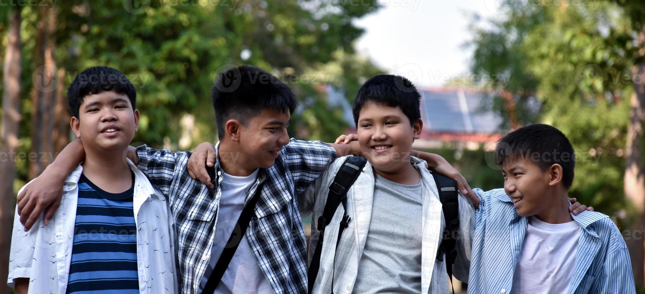 Portrait young asian teens spending freetime together along the way walking to home after music lesson at school, young adult asian couple concept. photo