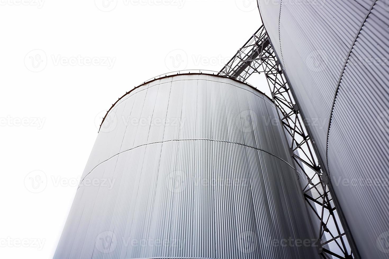 Silo Metal Sheet container settles on the ground with white background. photo