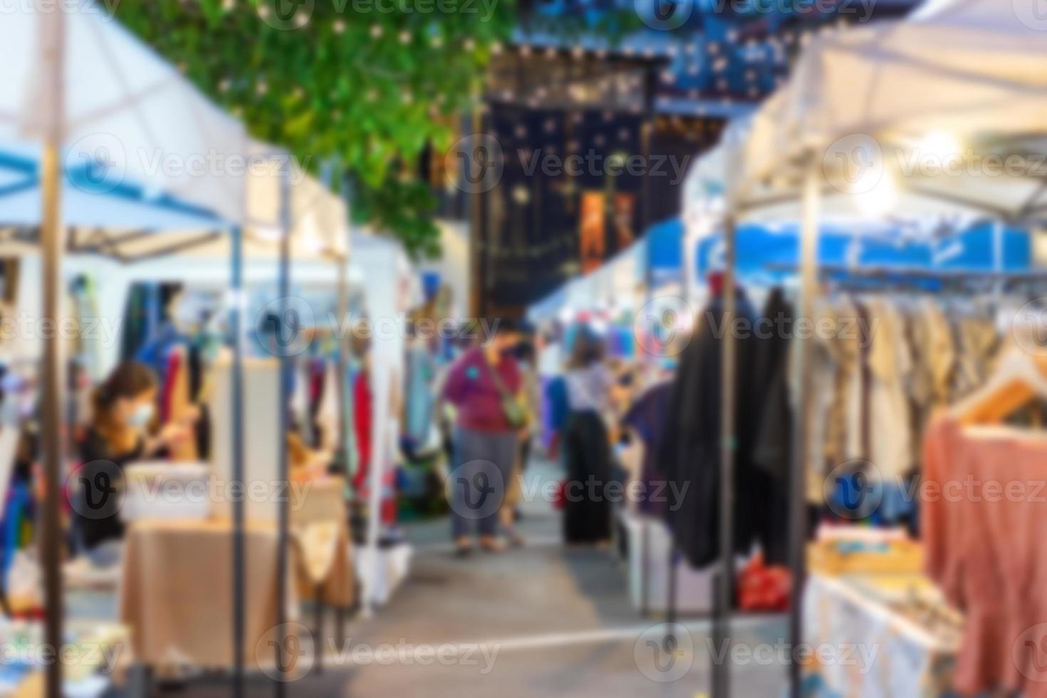 The blurry Market fair environment around shopping community and market place located in Asia. photo