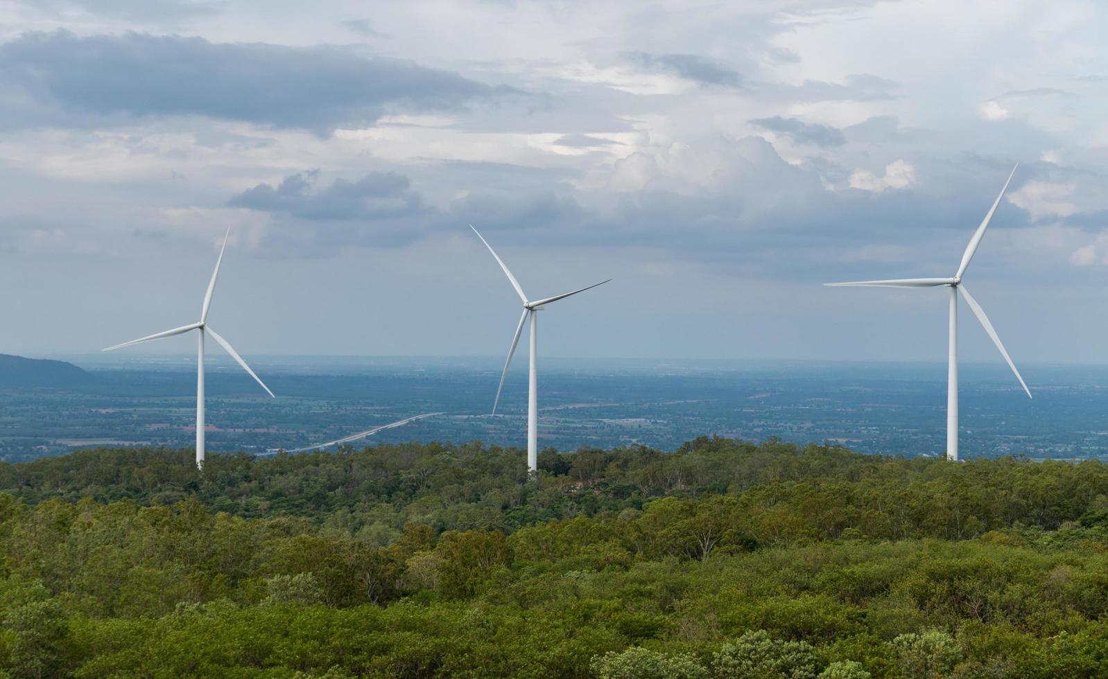 Wind turbines on yellow sky photo