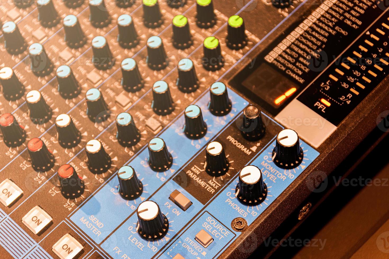 Close up scroll bar button control sound board mixer photo