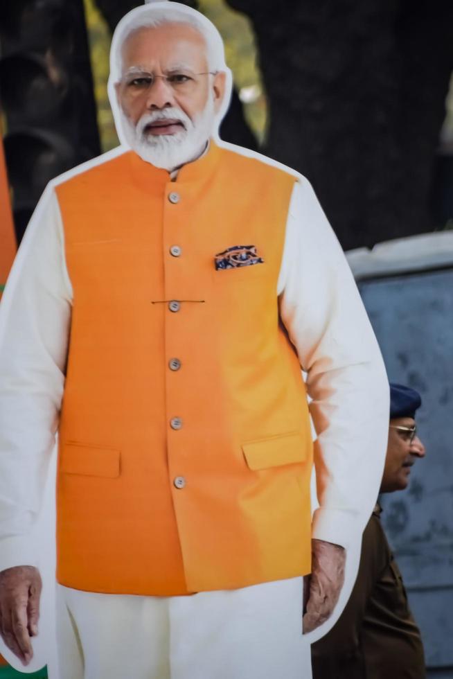 New Delhi, India - January 16 2023 - Prime Minister Narendra Modi cut out during BJP road show, the status of PM Modi while attending a big rally in the capital photo